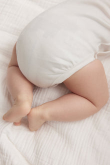 Baby white wrap bodysuit