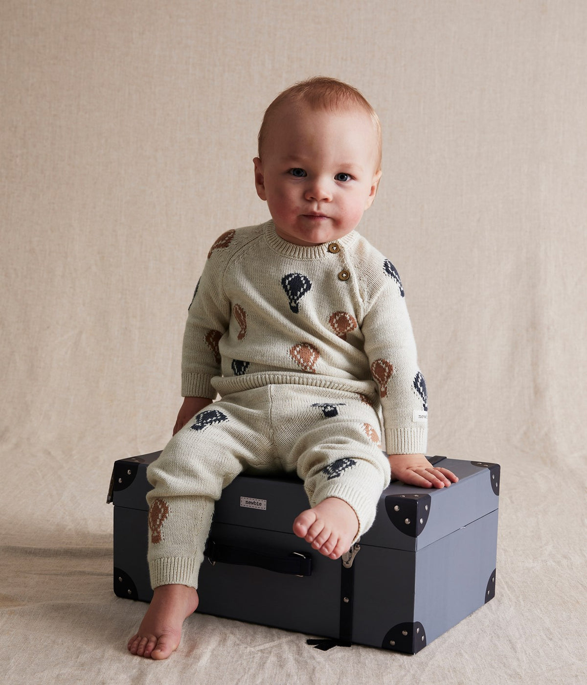 Baby beige knitted air-balloon sweater