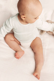 Baby white pointelle bodysuit