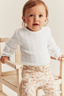 Baby white pointelle bodysuit