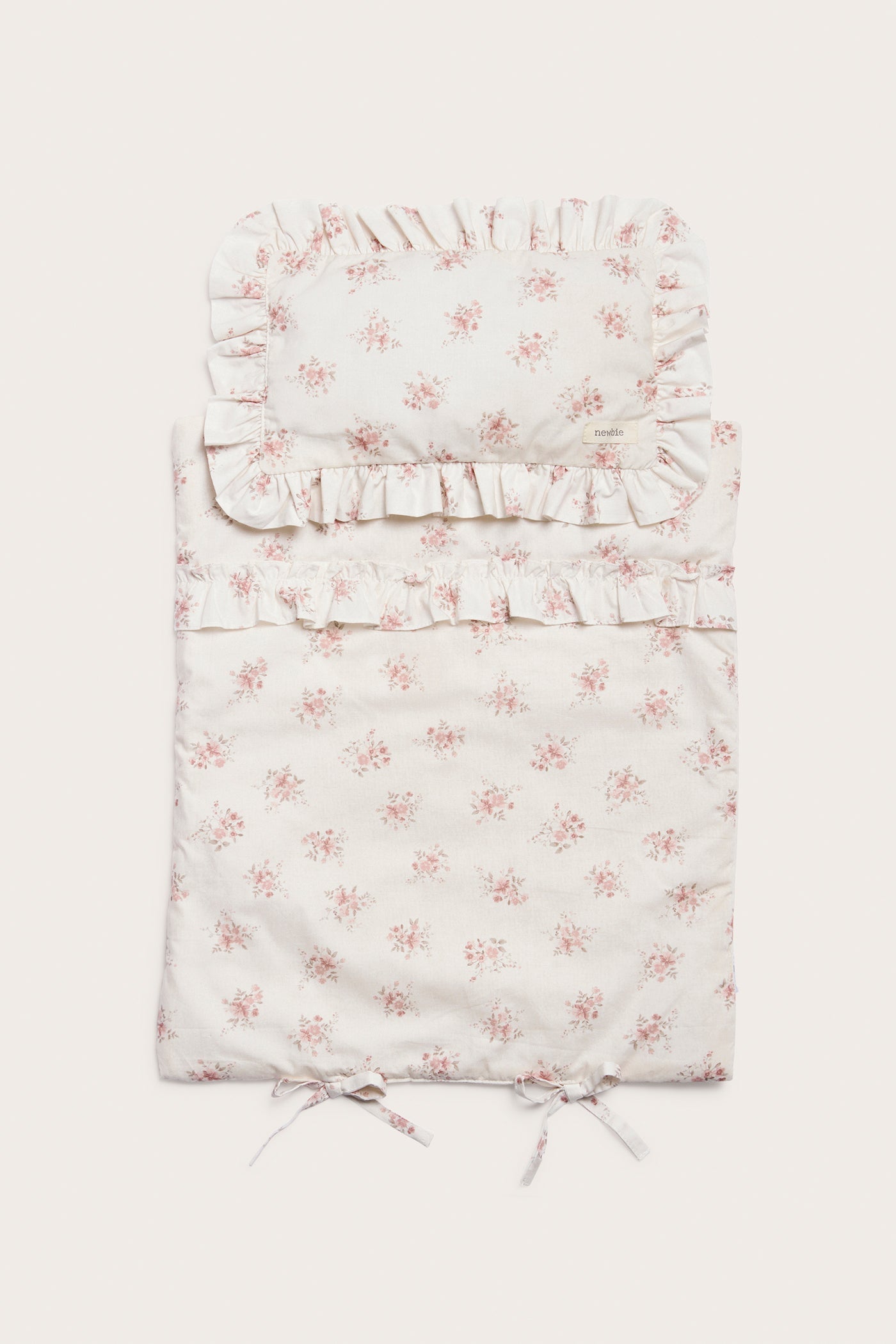 Floral bedding set for a doll bed