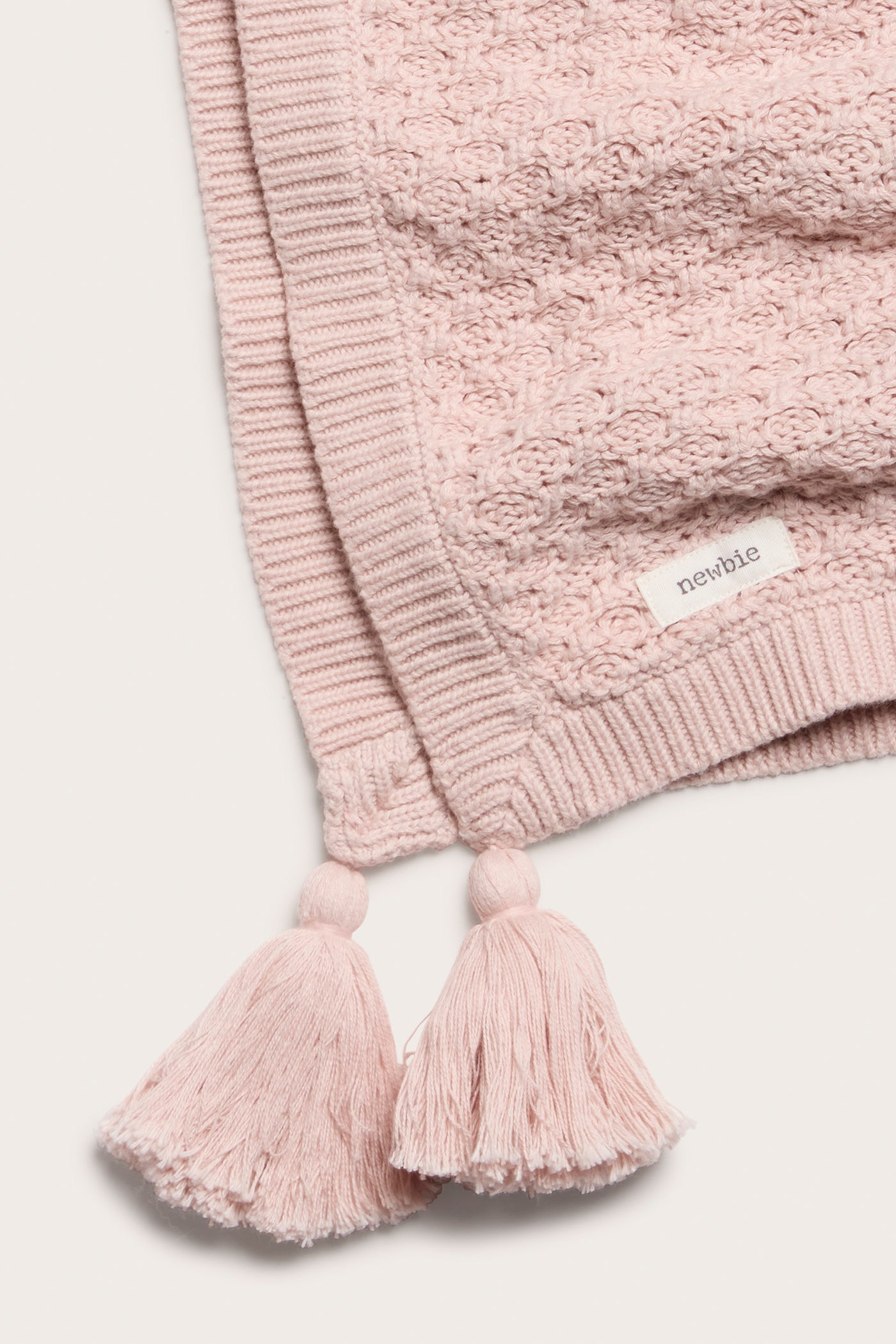 Baby pink knitted pattern blanket