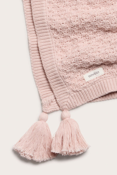 Baby pink knitted pattern blanket