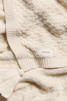 Baby beige knitted pattern blanket