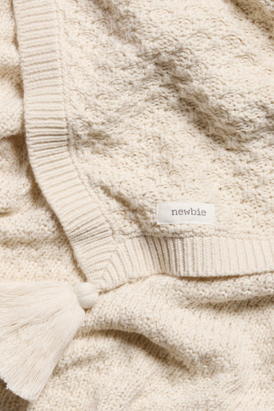 Baby beige knitted pattern blanket