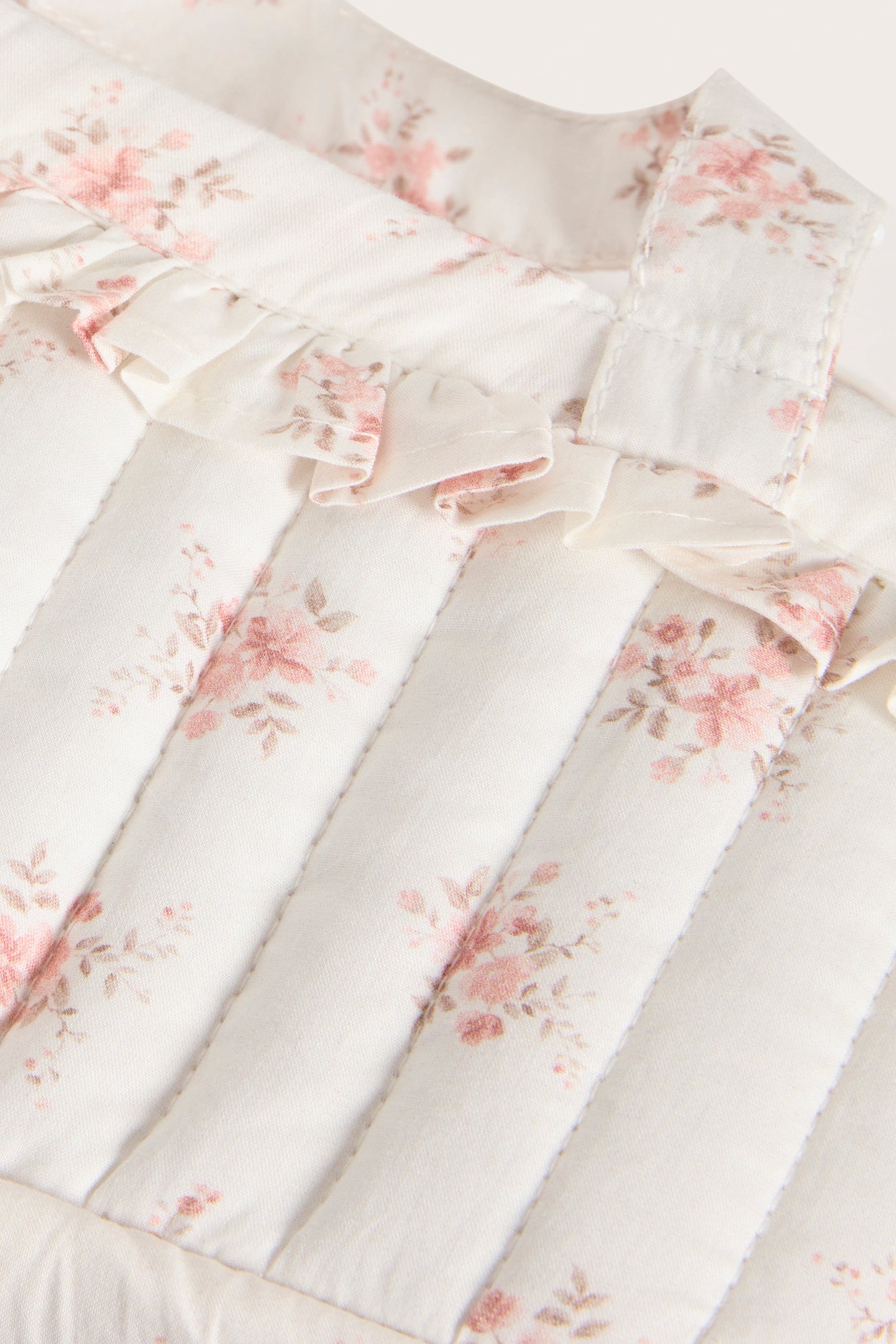 White floral quilted basket for dolls