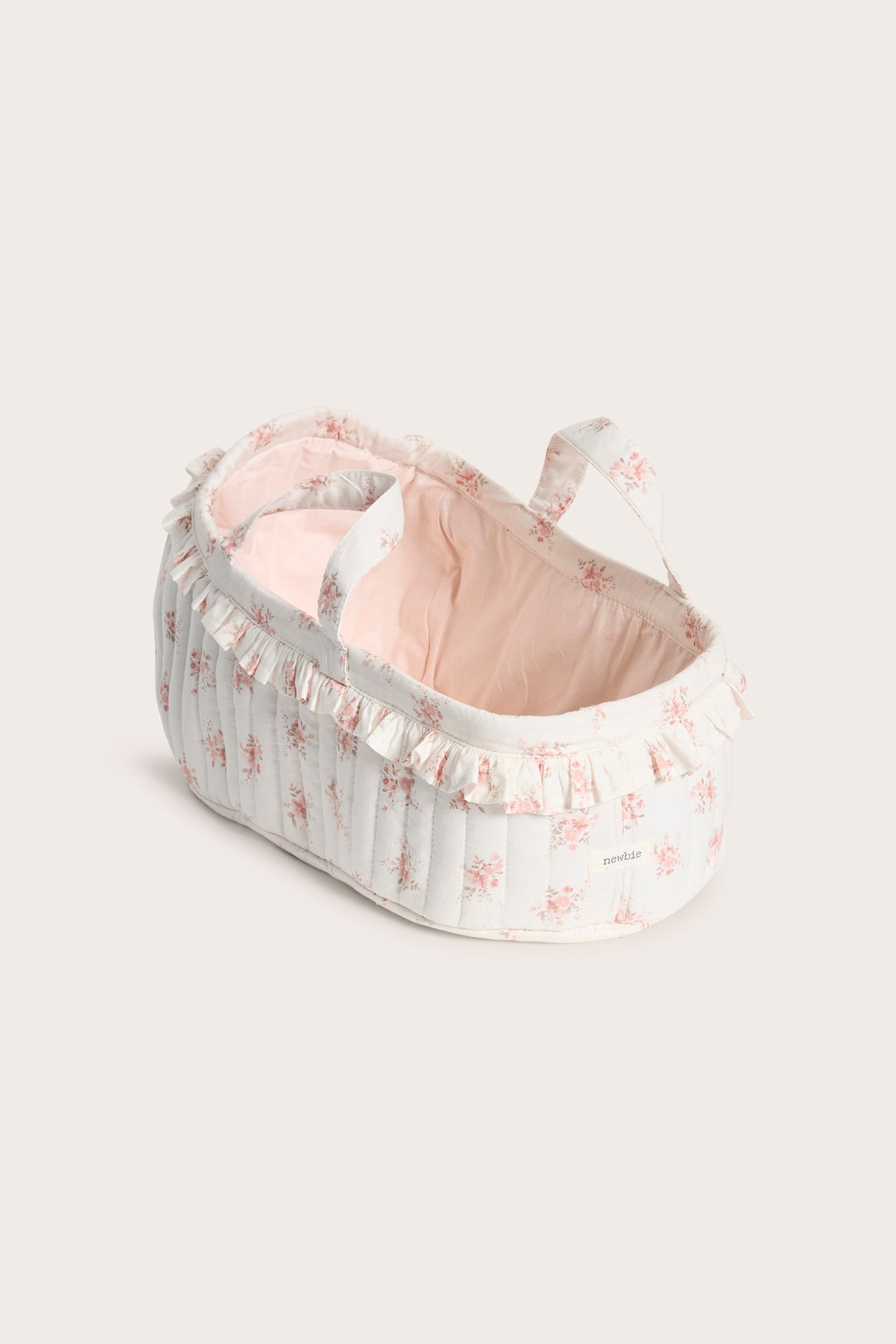 White floral quilted basket for dolls