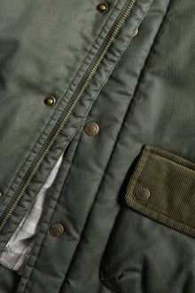 Kids green waxed jacket