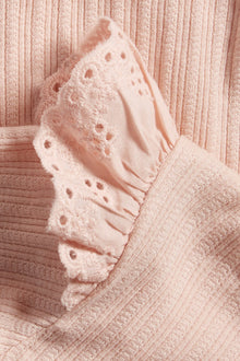 Baby pink bodysuit with ruffles