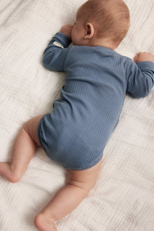 Baby blue ribbed bodysuit with extender