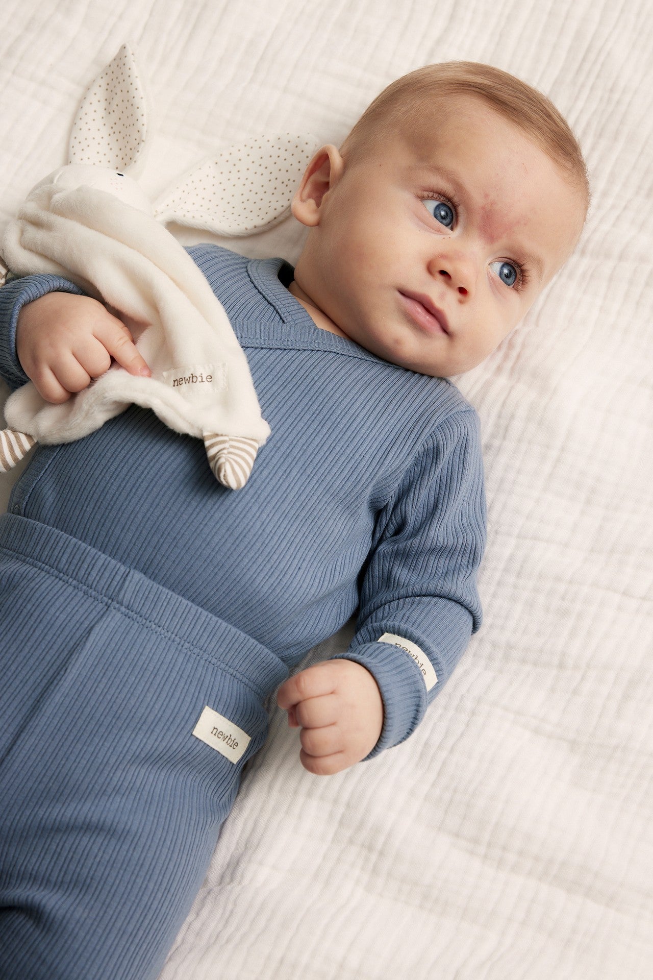 Baby blue ribbed bodysuit with extender