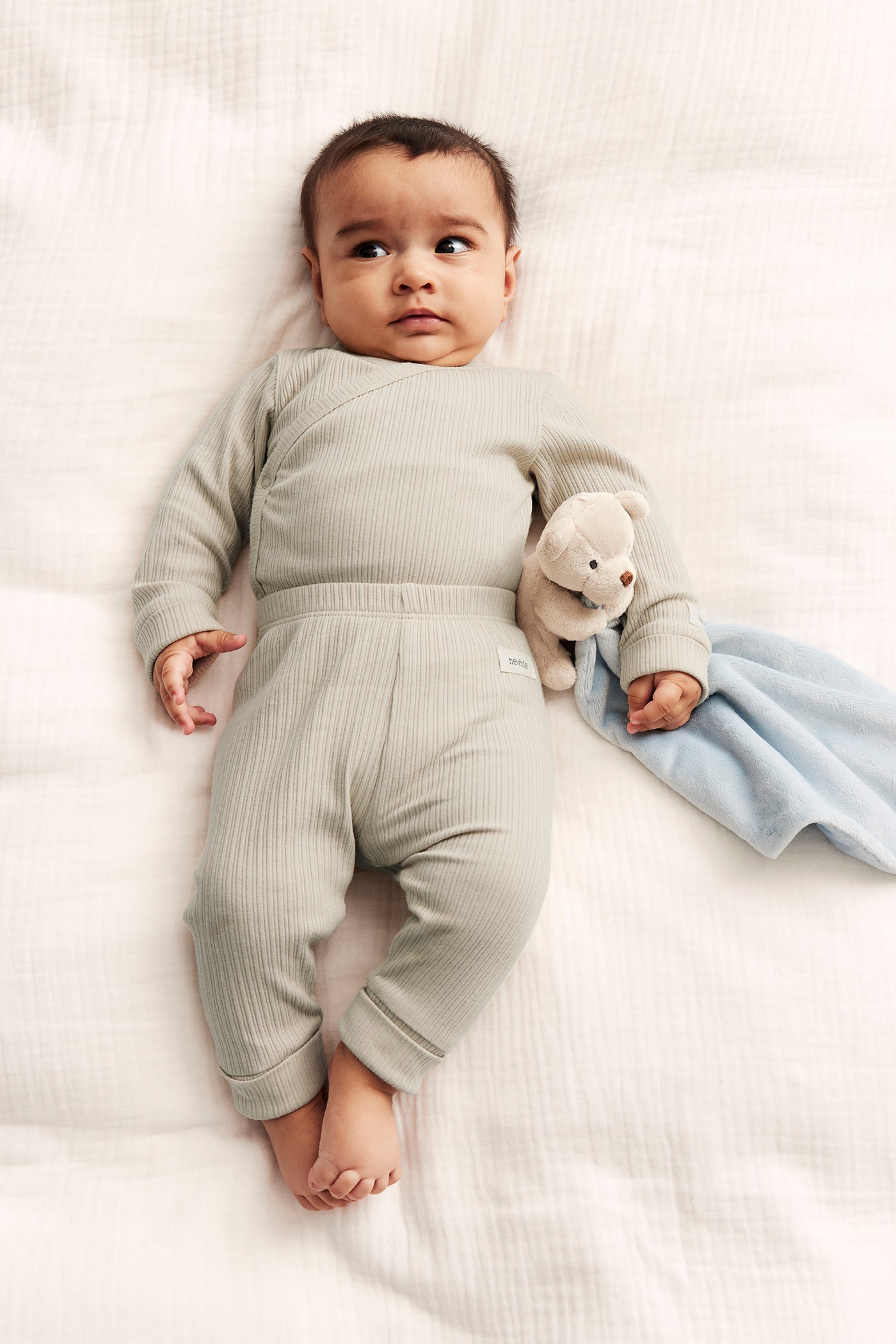 Baby beige ribbed bodysuit with extender