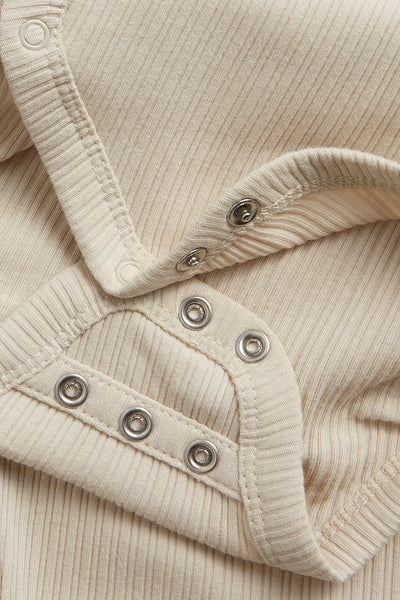Baby beige ribbed bodysuit with extender