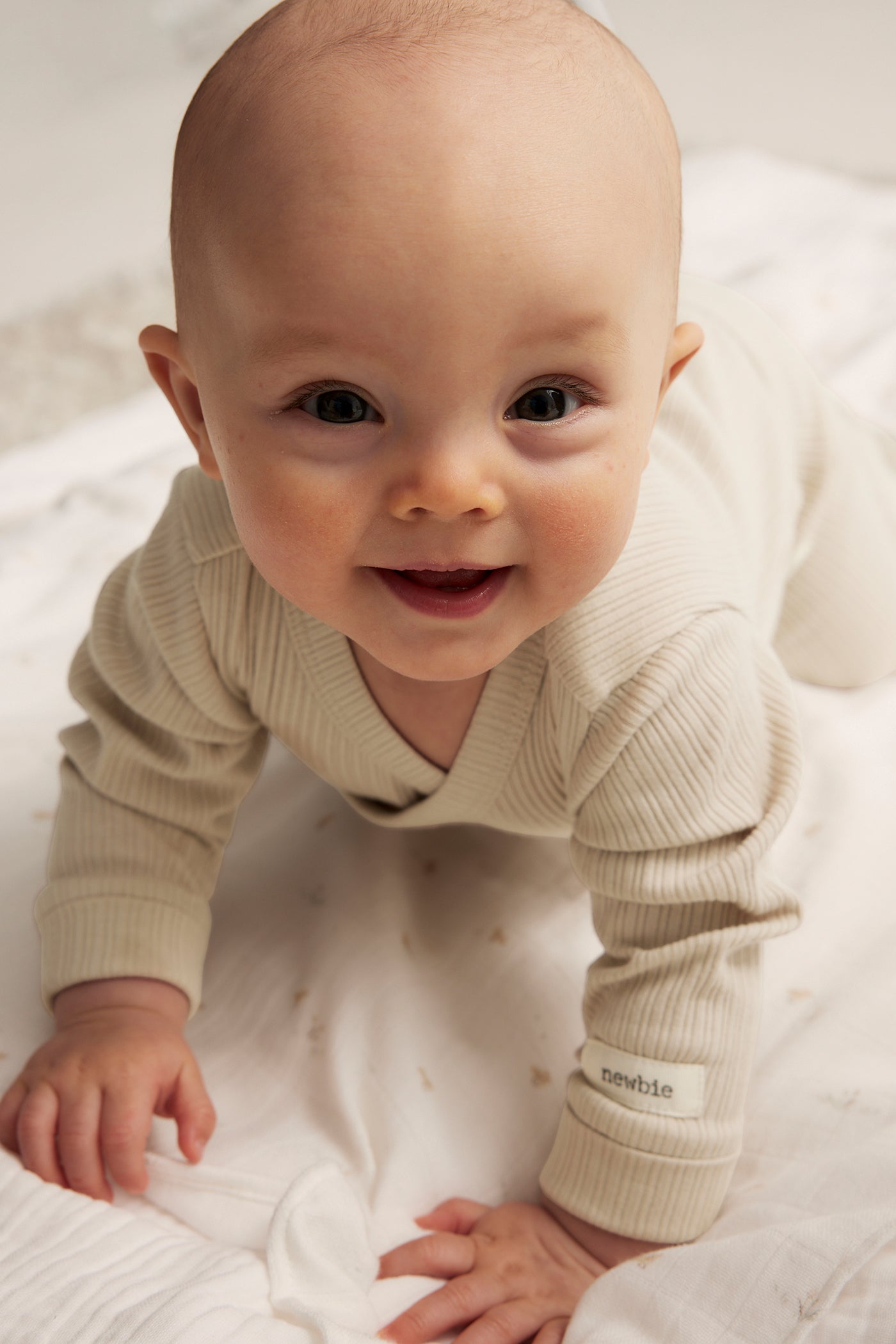 Baby beige ribbed bodysuit with extender