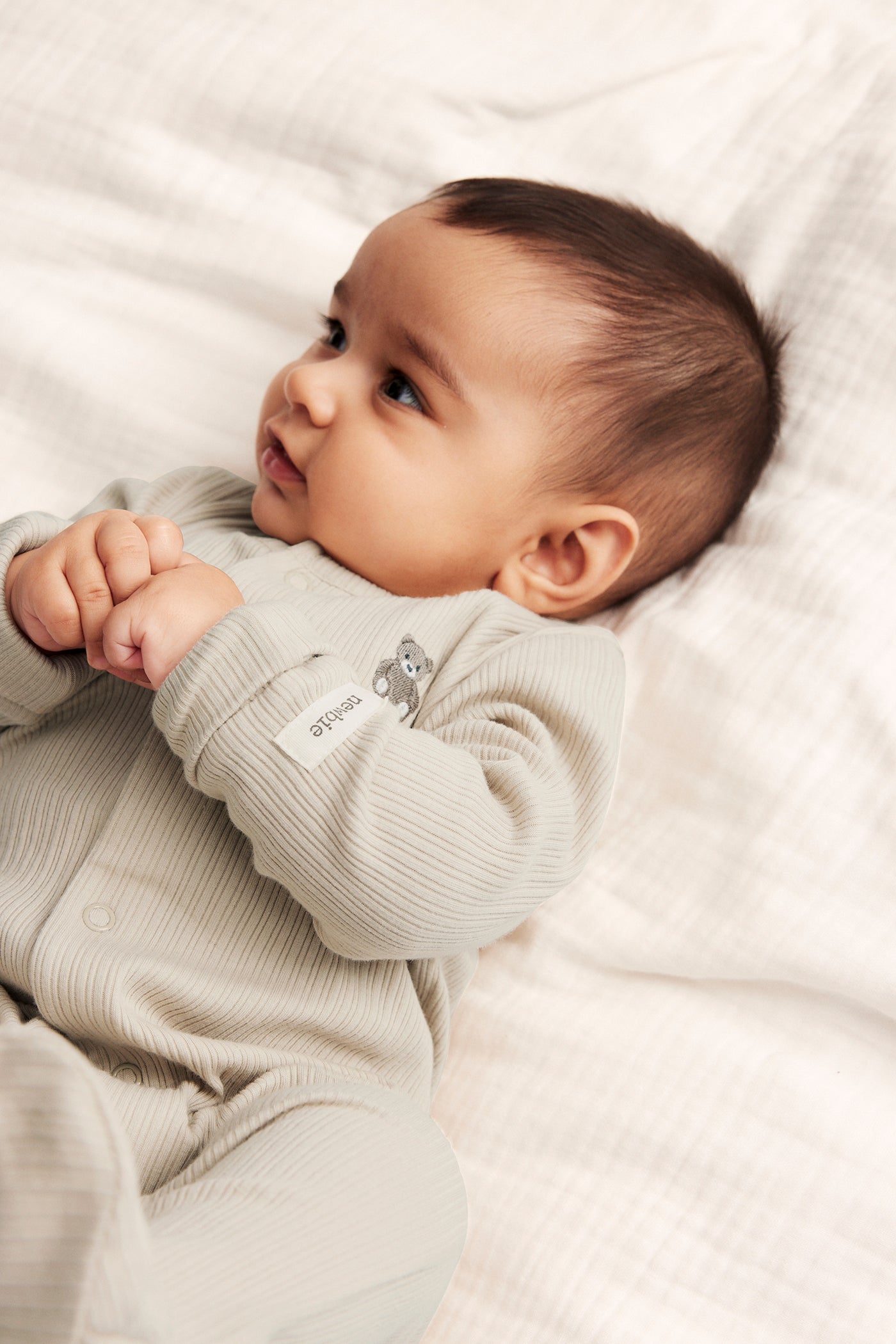 Baby beige ribbed sleepsuit