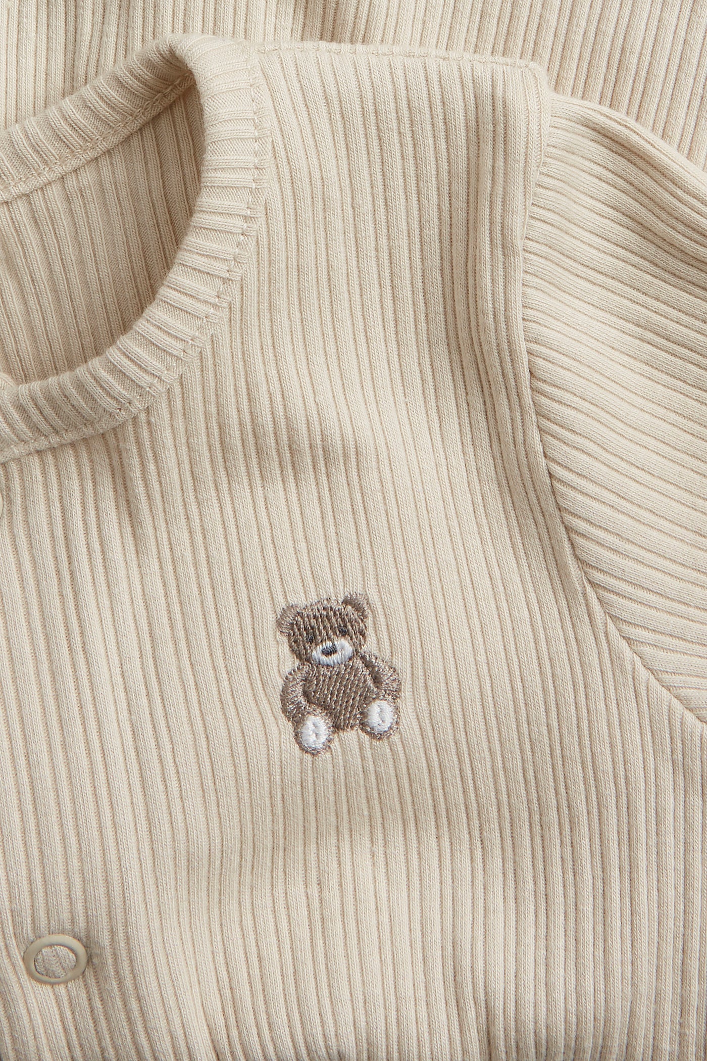 Baby beige ribbed sleepsuit