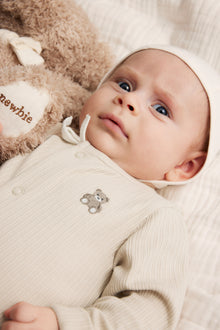 Baby beige ribbed sleepsuit