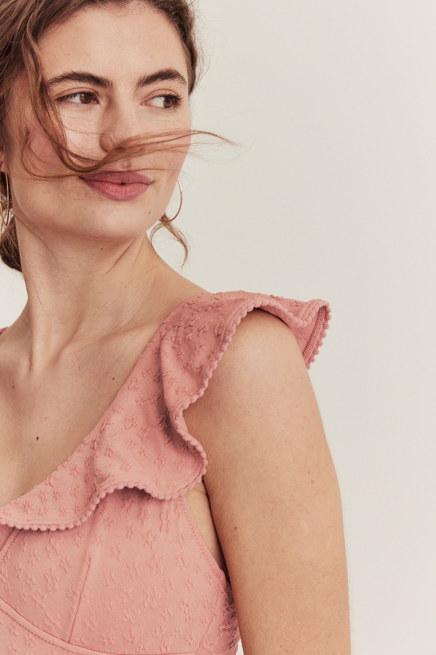 Women's pink swimsuit with ruffles