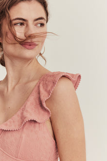 Women's pink swimsuit with ruffles