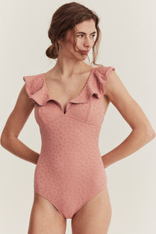 Women's pink swimsuit with ruffles