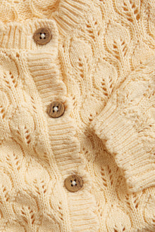 Baby yellow knitted cardigan