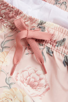Kids' pink floral swimming trunks