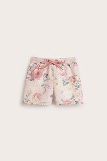 Kids' pink floral swimming trunks