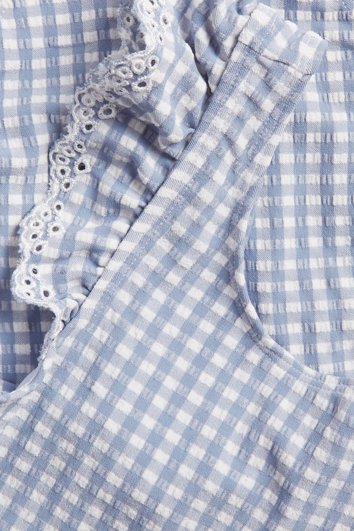 Kids' blue swimsuit with ruffles