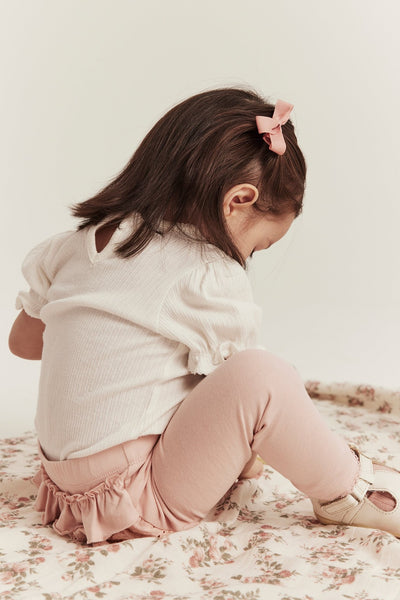 Baby light pink leggings with ruffles