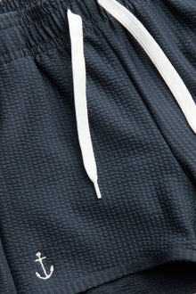 Kids' blue anchor swim shorts