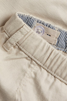 Kids´ beige woven shorts