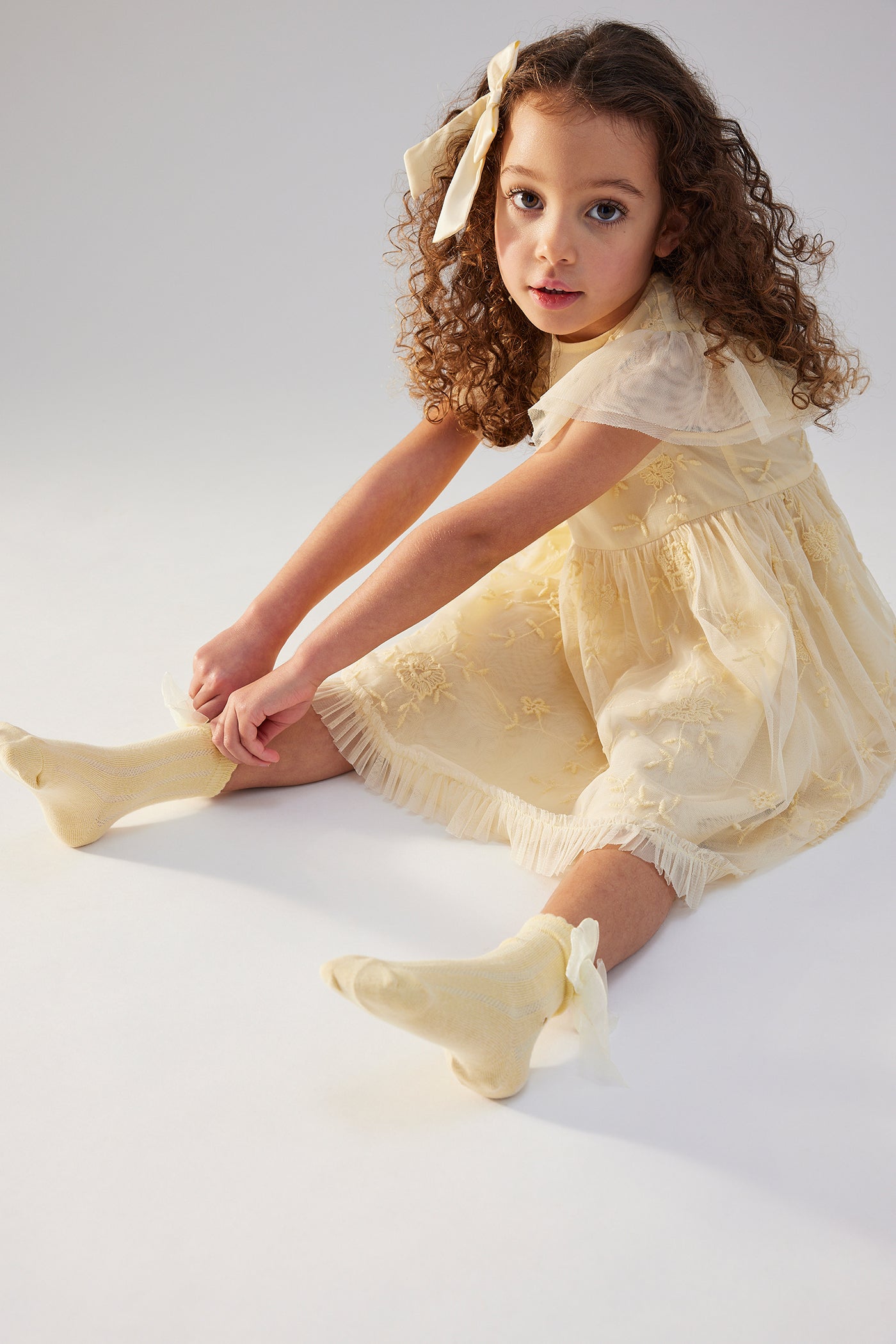 Kids' yellow socks with organza bow