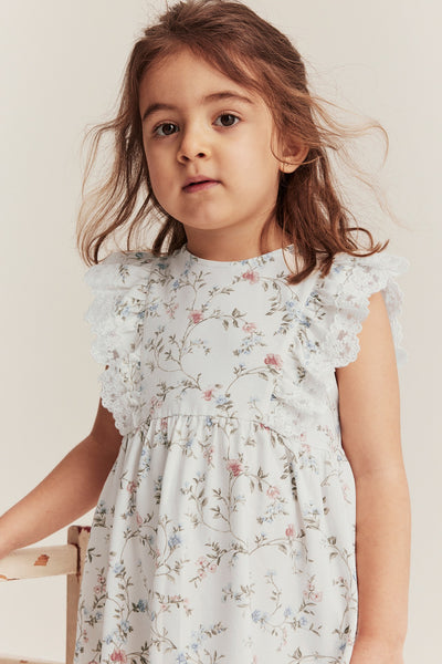 Kids´ white floral short-sleeved dress