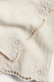 Kids´ beige embroidered trousers