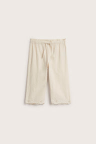Kids´ beige embroidered trousers