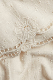 Women's beige embroidered shorts