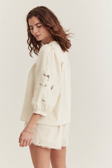 Women's beige embroidered blouse