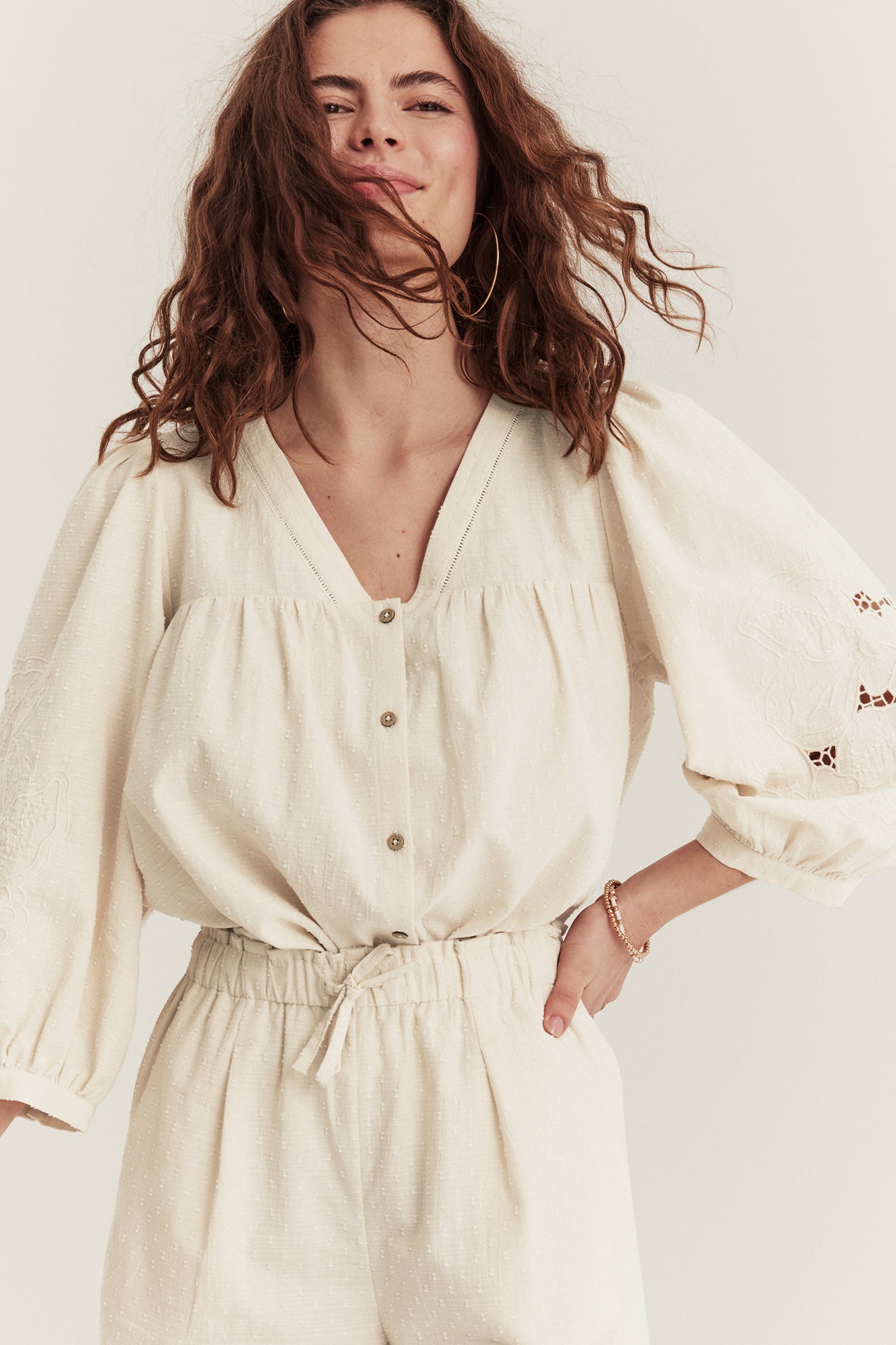 Women's beige embroidered blouse