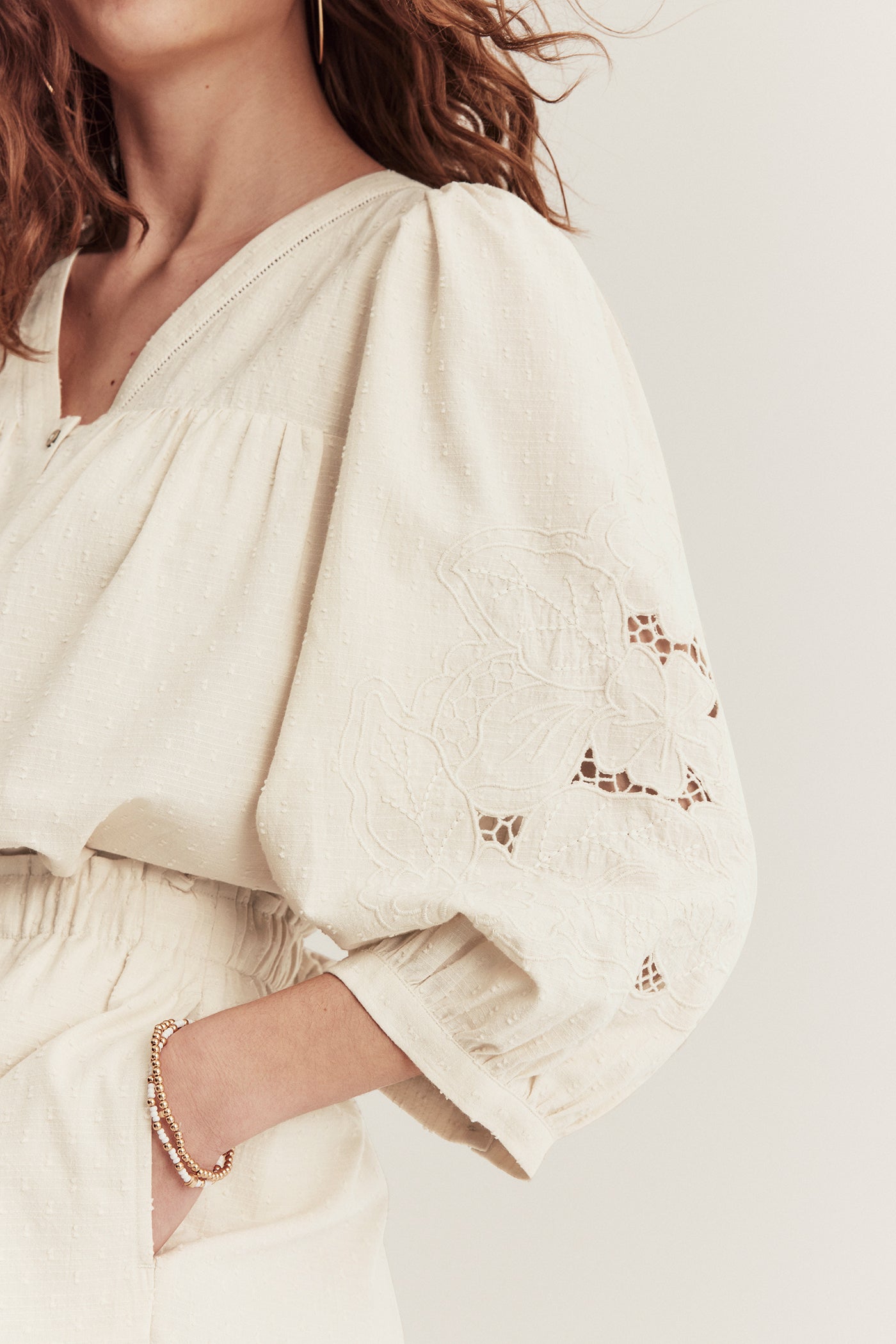 Women's beige embroidered blouse