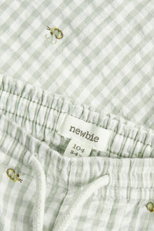 Kids´ green checked bumblebee shorts