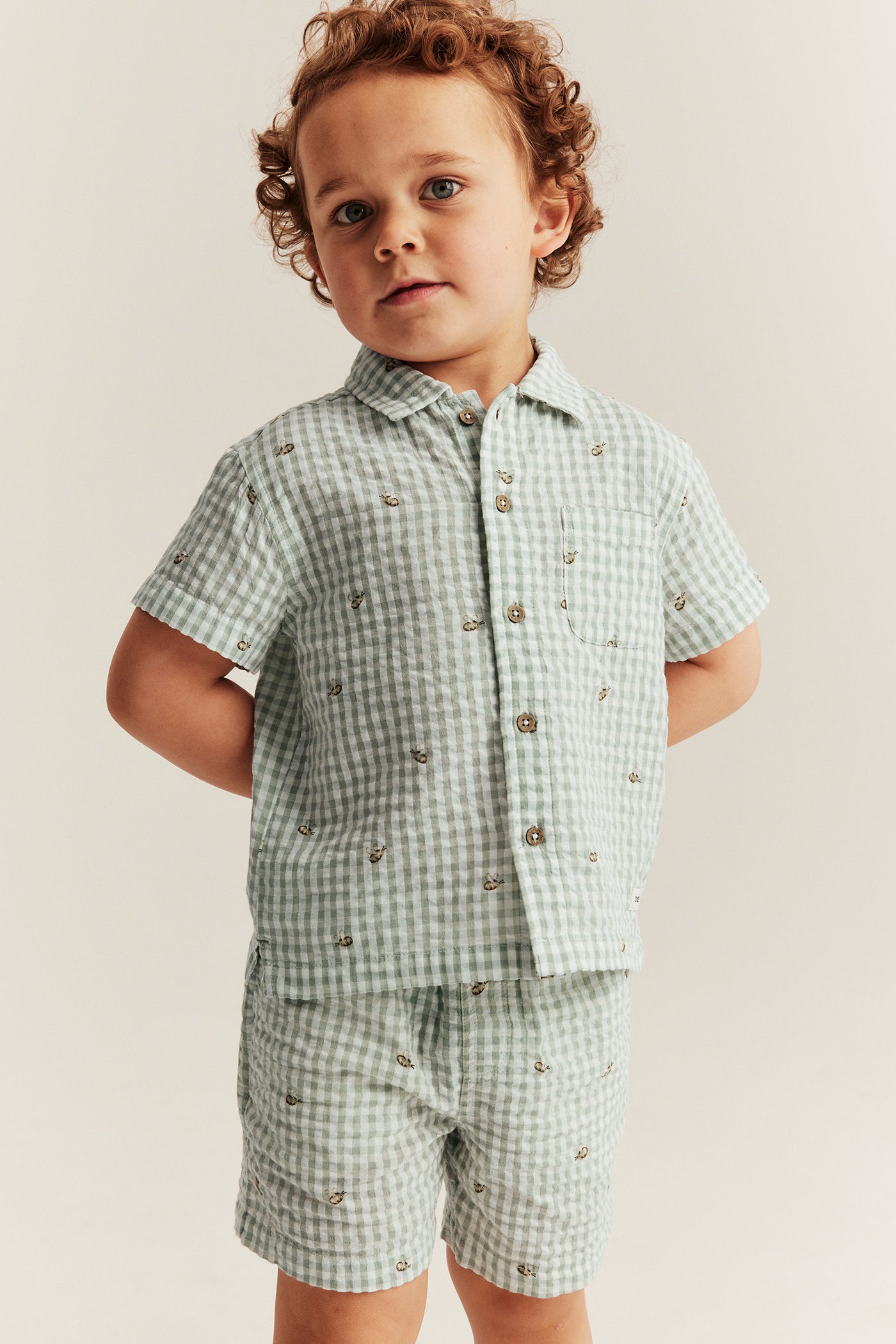 Kids´ green checked bumblebee shorts