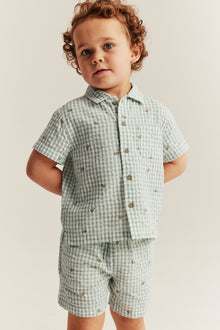 Kids´ green checked bumblebee shorts