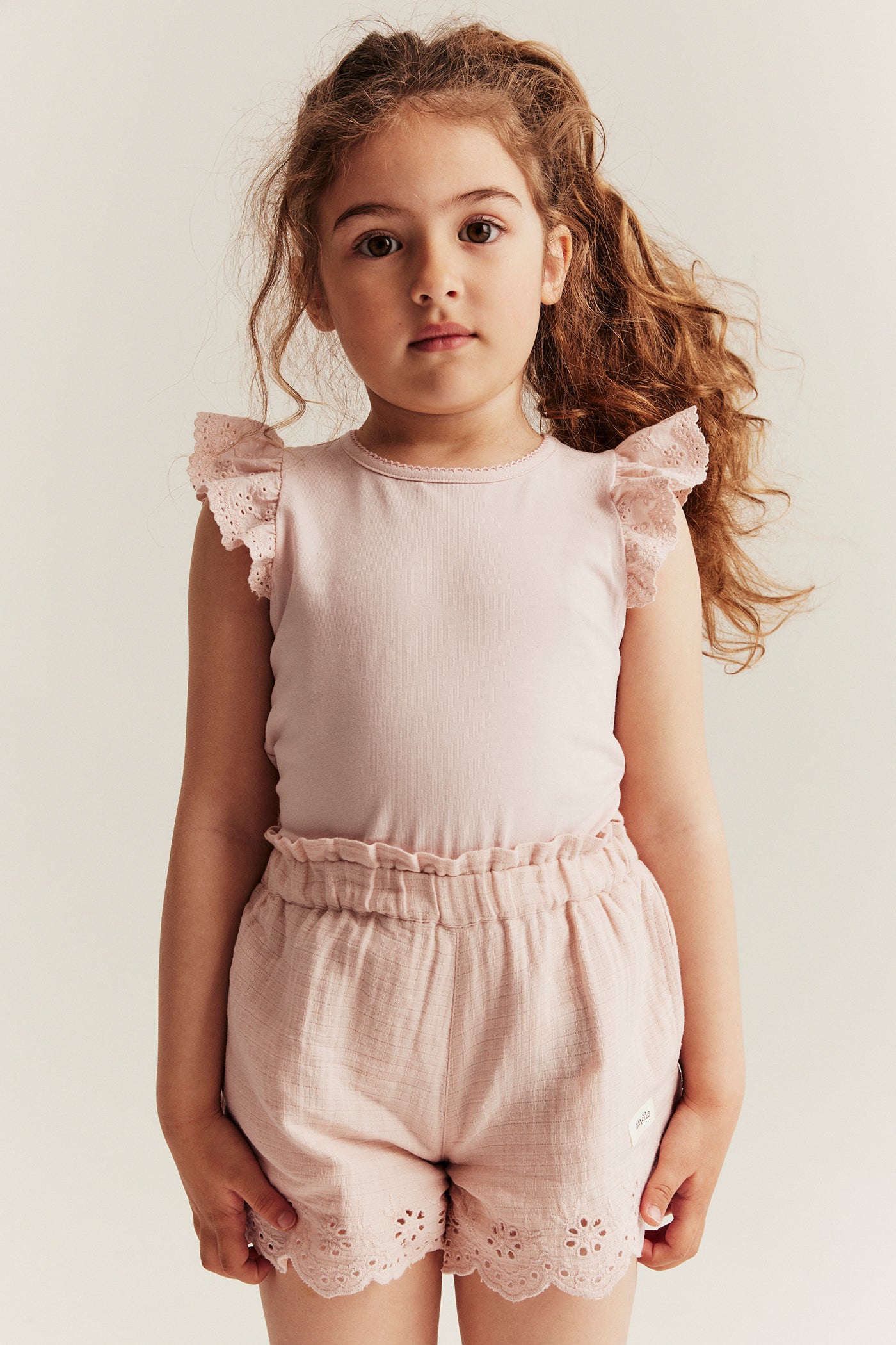 Kids' pink embroidered shorts