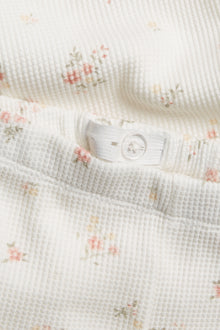 Kids' white floral trousers