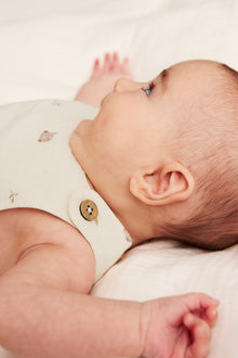 Baby beige romper with teddy bears