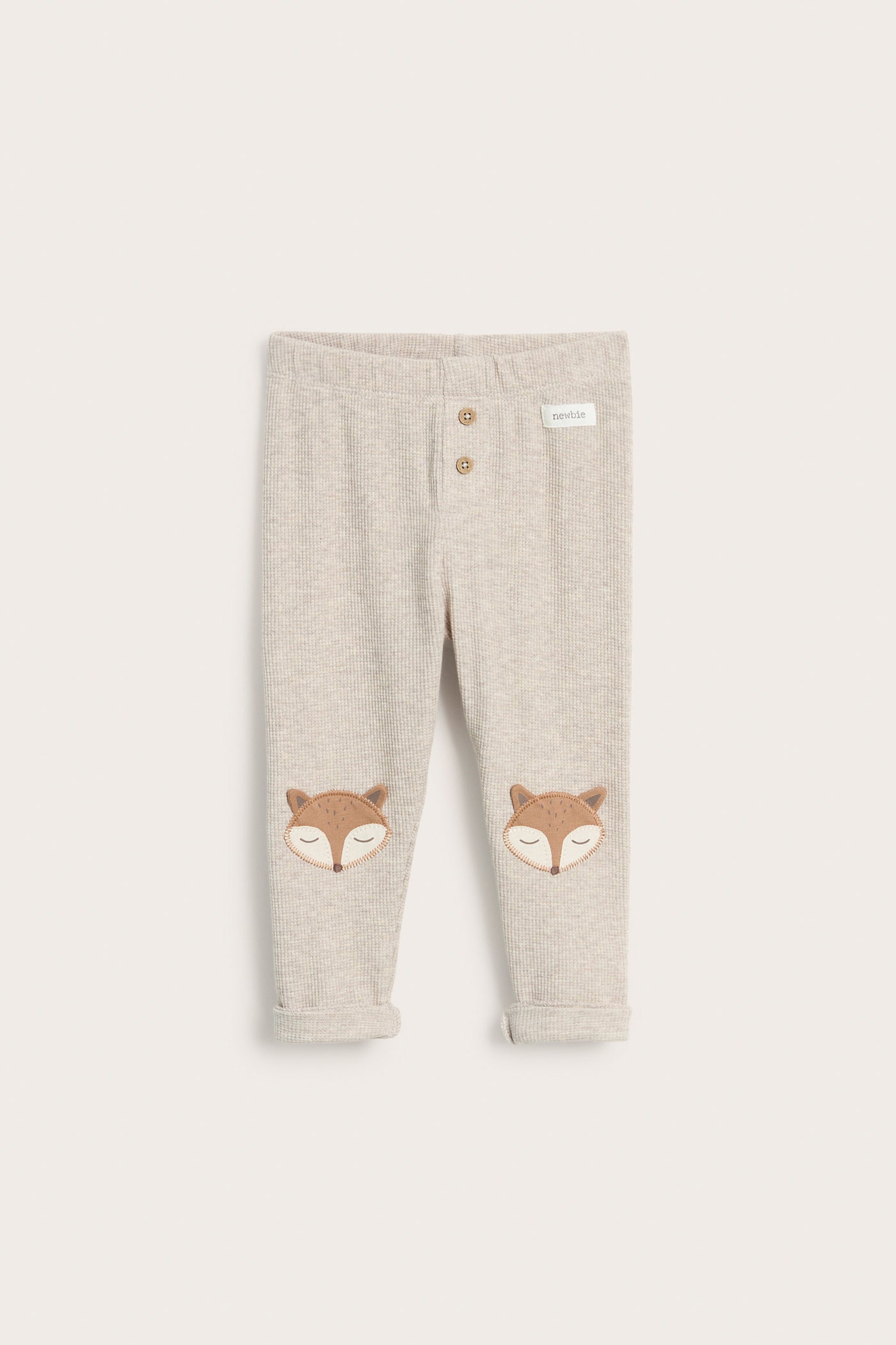 Baby beige leggings with foxes