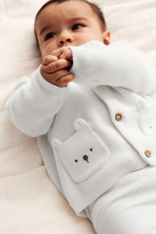 Baby white cardigan with cute pockets