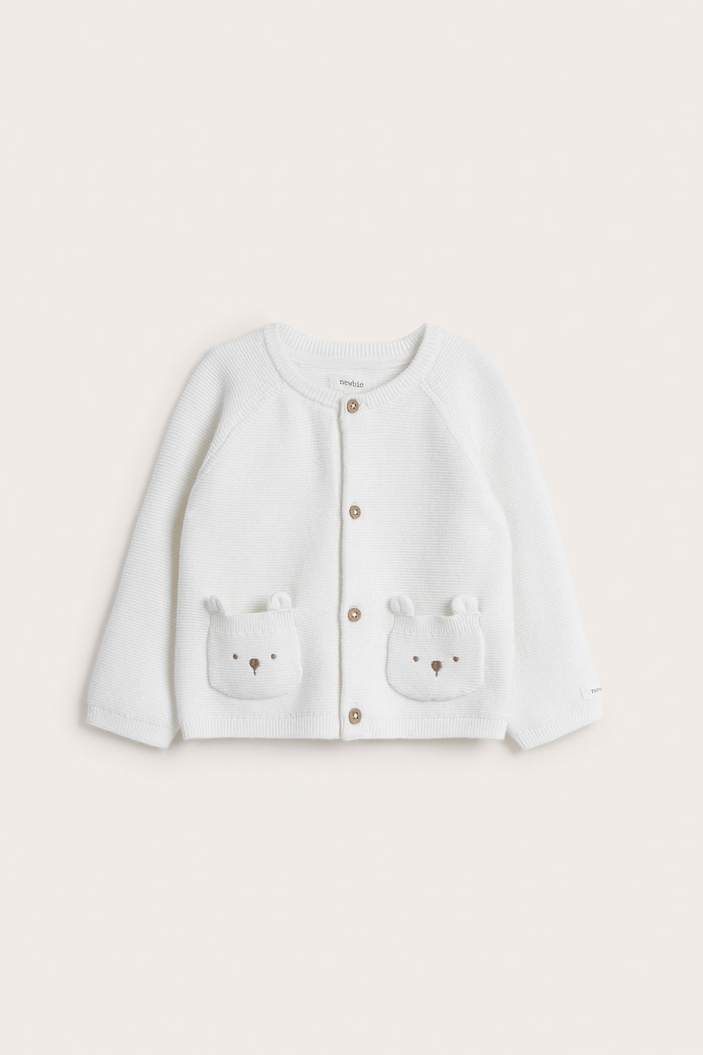 Baby white cardigan with cute pockets