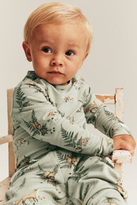 Baby green bodysuit with animals