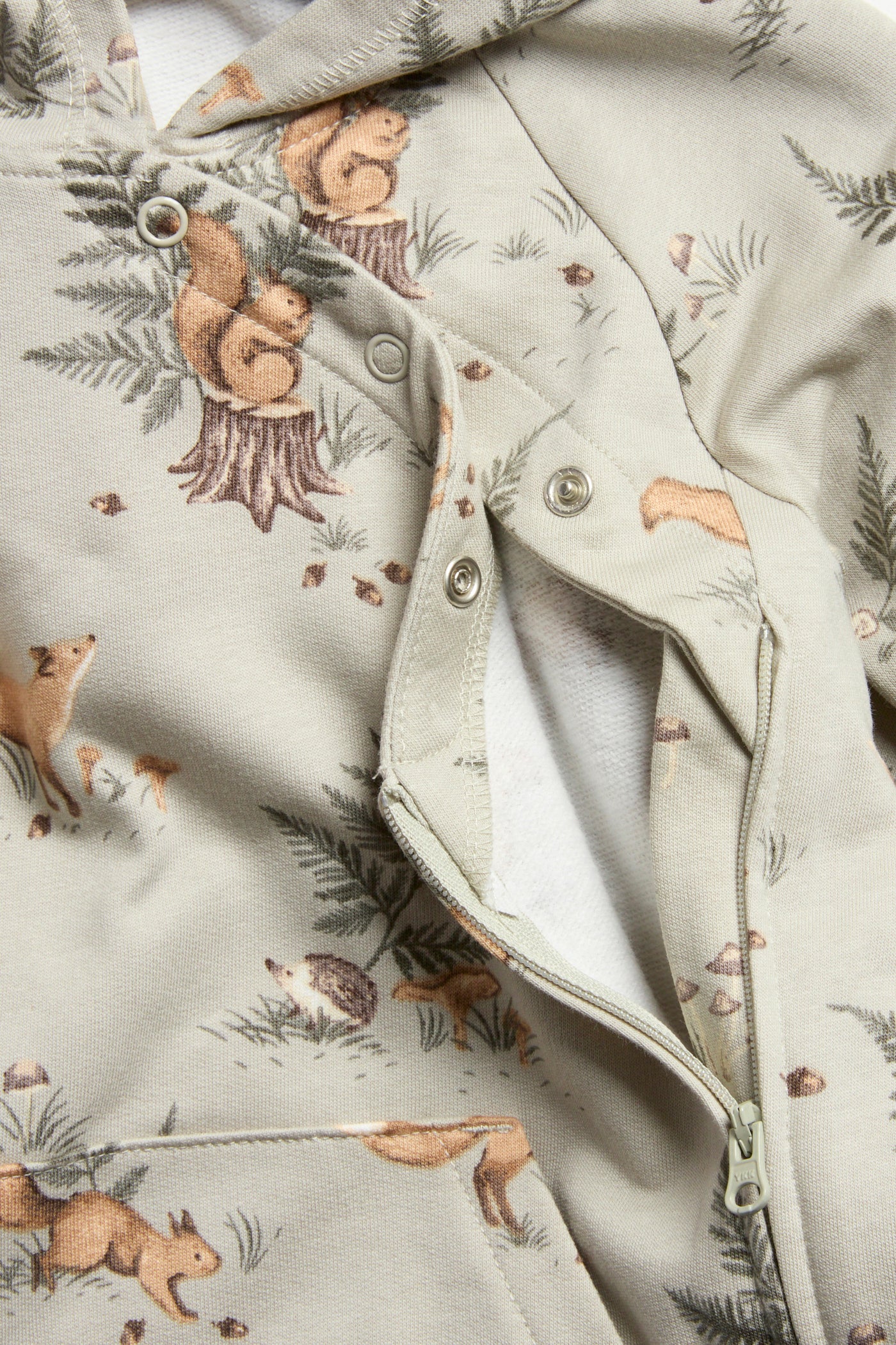 Baby green forest-patterned onesie